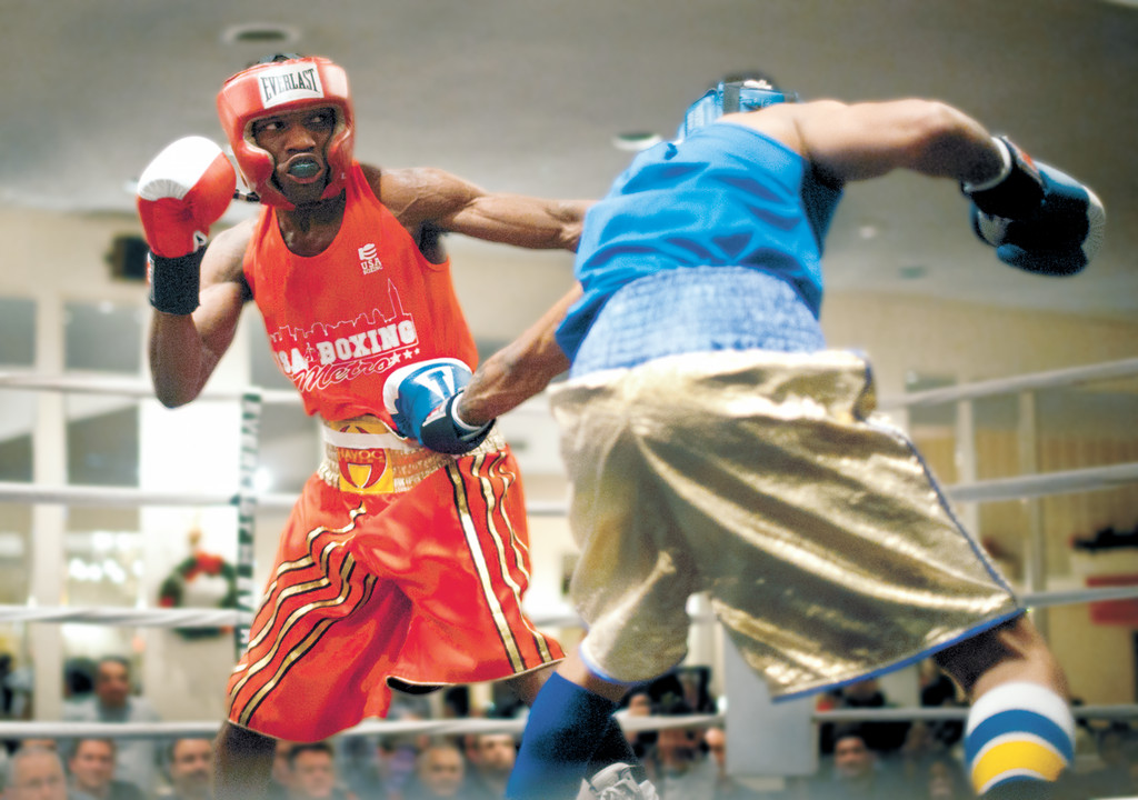 Titus Williams, left, 22, fought Marlon Brown of Rockaway Ropes in the final bout of the 2011 New York Metropolitan Championship last Friday at the Plattdeutsche Park Restaurant in Franklin Square.