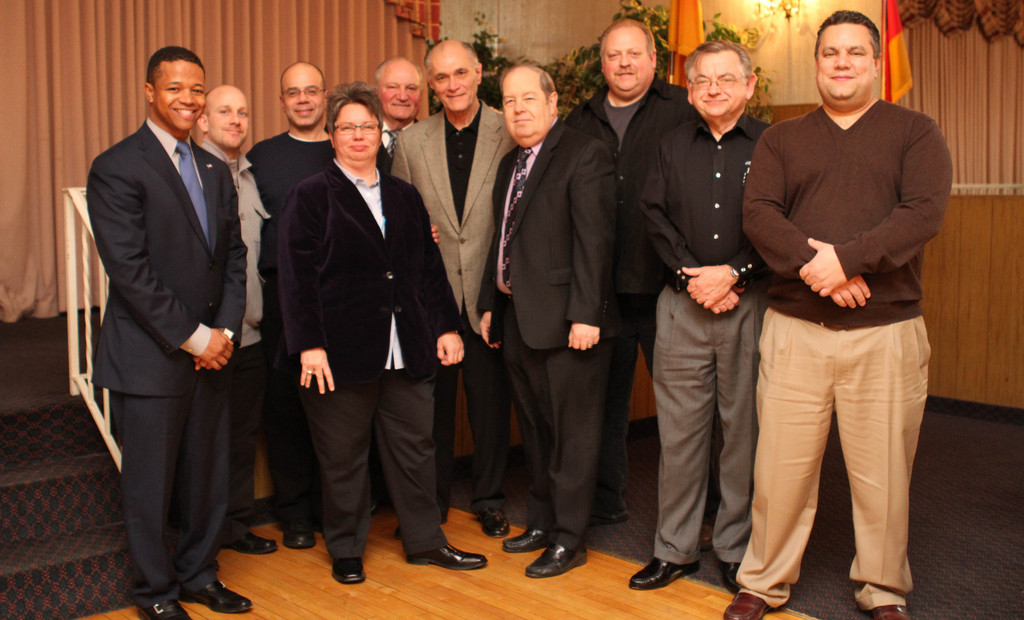 Nassau County Legislator Carrié Solages, left, swore in the Franklin Square Chamber's 2012 Board of Directors, which includes Mike Sacco, second from left, Vincent Giordano, Mary Seifert, Bruno V. Caracciolo, Lou Milazzo, Glen Rogers, Frank Francia, Bill Youngfert and Bill Zacharias.