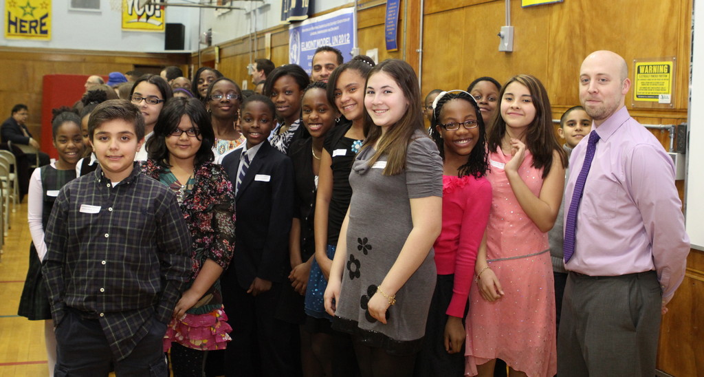 Elmont's Model UN student delegates posed with teachers from the district, following a Model UN reception held on Feb. 1.