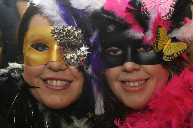 Geraldine Brand, left, of Floral Park, and Courtney Schwizer, of Bellerose, were all smiles at the Masquerade Ball in Franklin Square on Feb. 4.