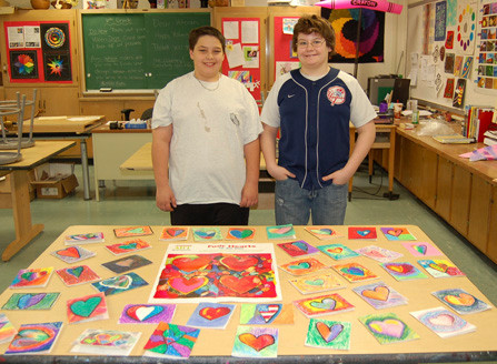 Sixth-graders at Lynbrook North Middle School made colorful Valentines for Veterans. Pictured with the cards are William Spatenga, left, and Ryan Mueller.