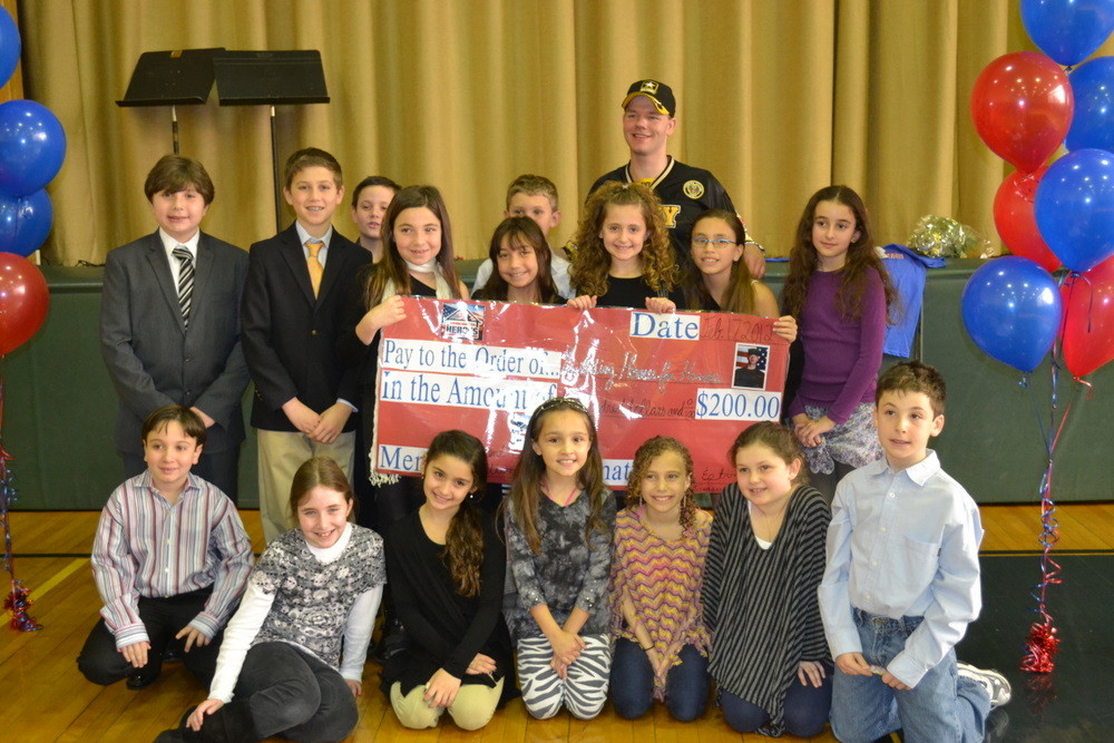 The Waverly Park Student Council presented Christopher Levi with a check for $200.