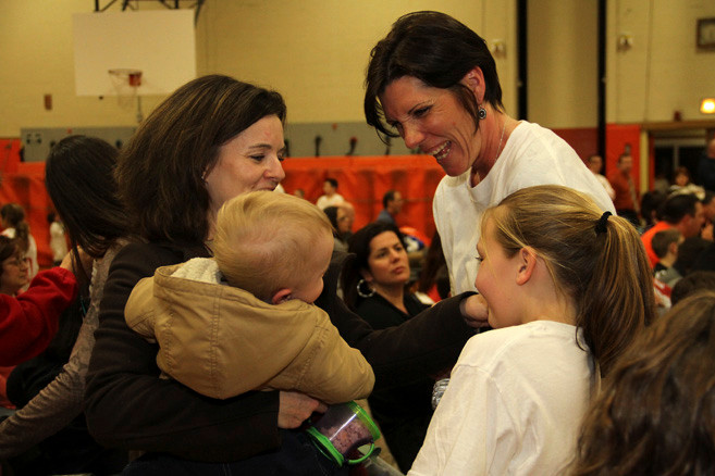 Tracy McGrath and her daughter, Kelli-Anne, greeted friends during the fundraiser.