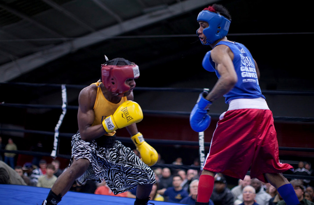 Williams, left, won the 2012 Golden Gloves’ first bout, against Marlon Brown, by technical knockout.