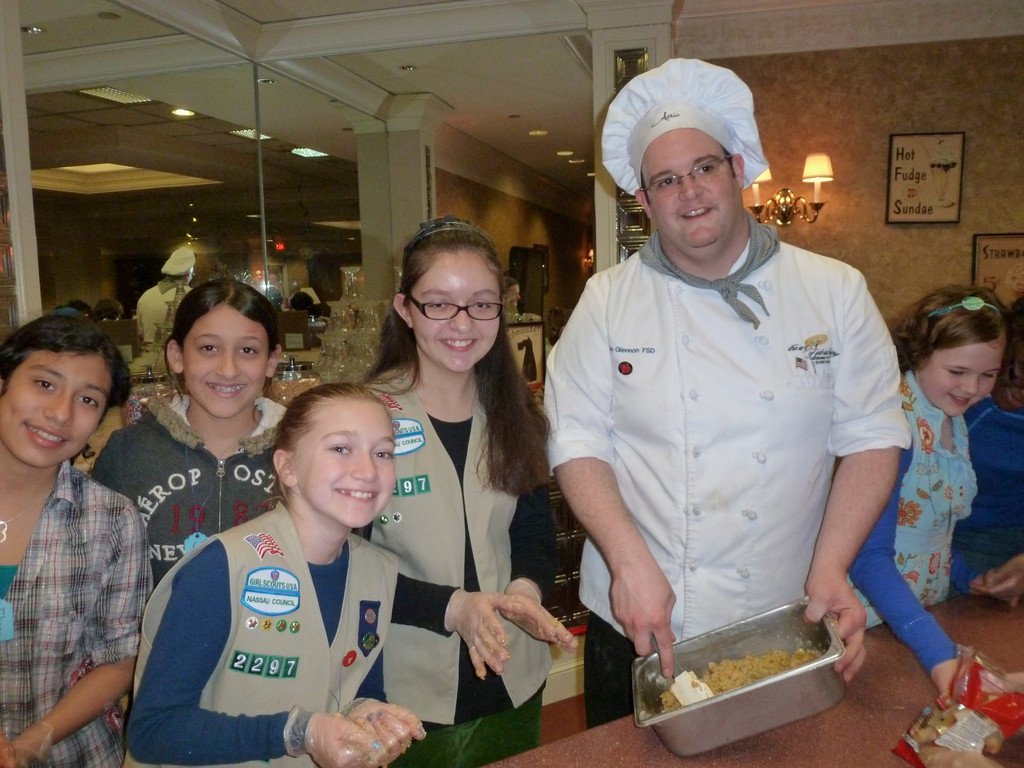 Atria Chef Brian Glennon showed the Girl Scouts how to whip up a dish.