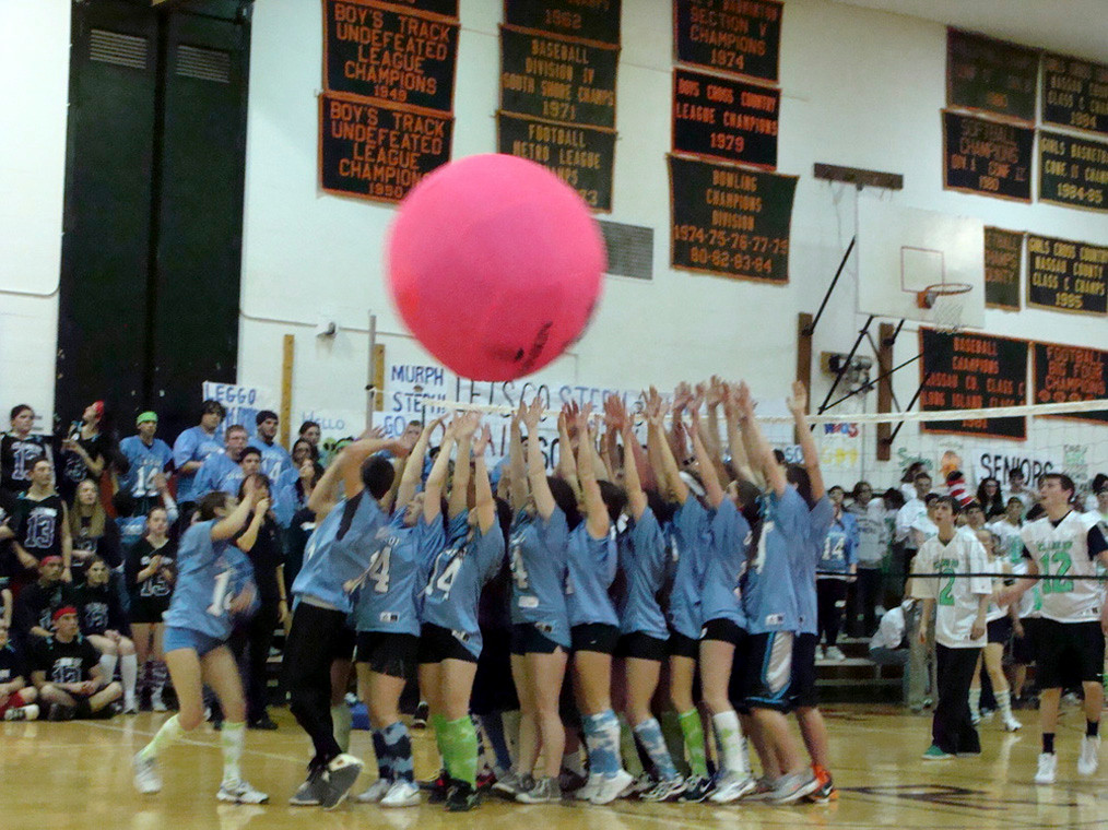 The sophs serve during Cage Volleyball.