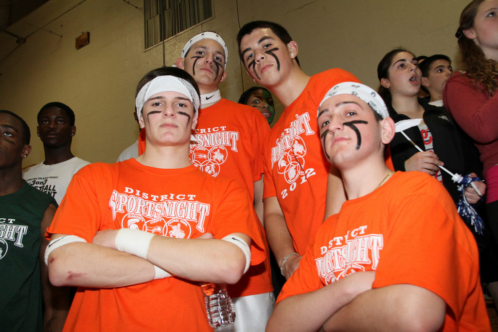 Carey High Schoolers Nick Karamitsios, from left, Steven Miotto, Chris DeAlmeida and Nick Fasano showed school spirit with coordinated outfits and face paint.
