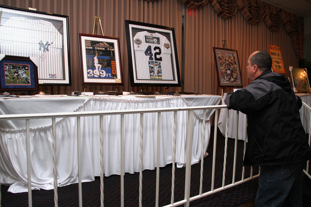 Local resident Bill McCaffrey checked out a Mariano Rivera jersey that was being auctioned at the J.A.C.K. event on March 9.