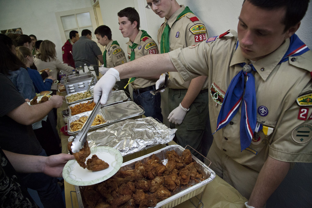 Lenny Burger 13, Troy Gerrity 17, Scott Marzigliano 17, and Peter Grieco 18 feed the masses.The members of the Bellmore Boy Scouts serve food to raise money for the eagle scout project to beautify the Grace Baptist Church in Franklin Square and help Christopher Kosowski gain eagle scout status.