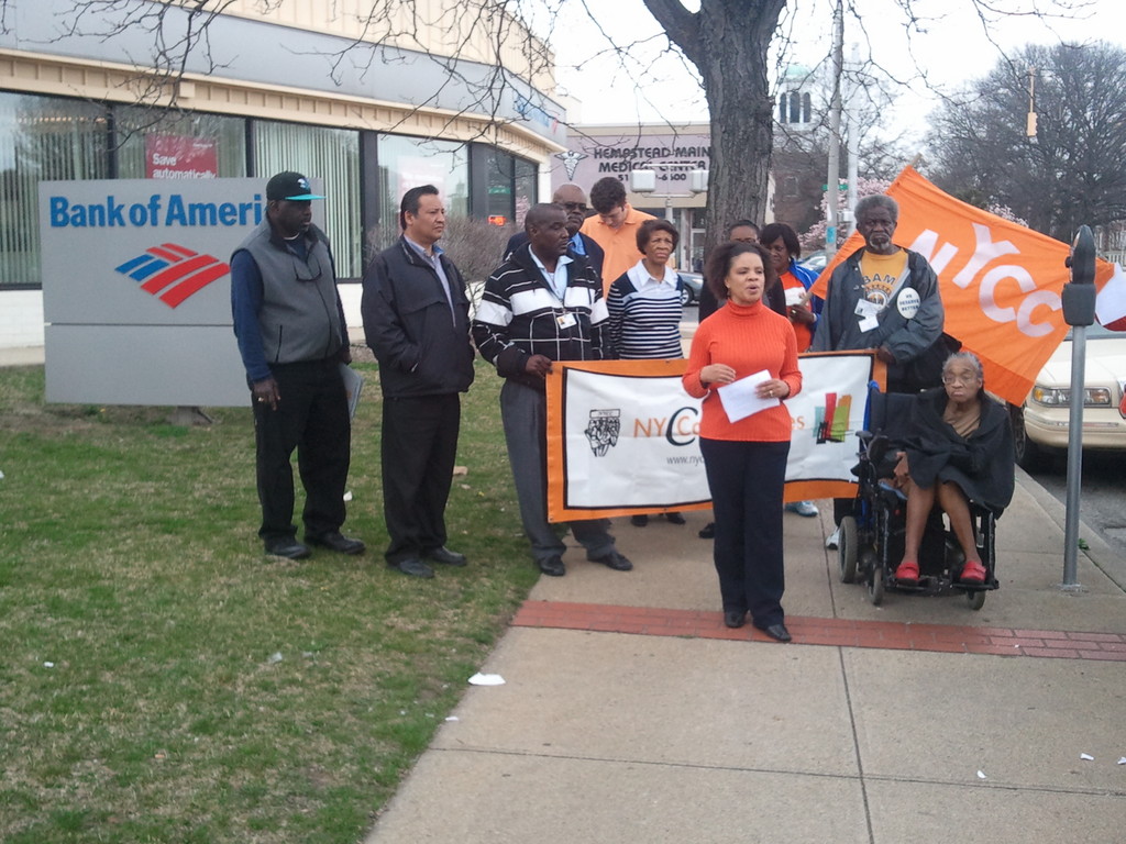 Several local residents, including Elmont resident Mimi Pierre-Johnson, participated in a rally against inflexible mortgage-modification practices on March 21, in Hempstead.