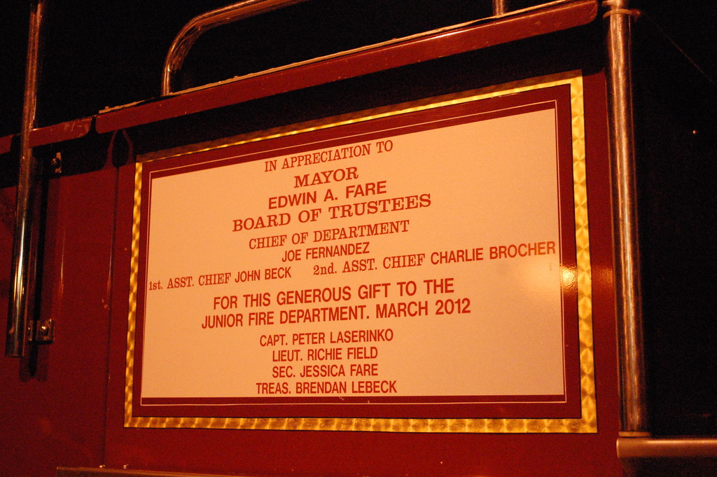 The sign dedicating the fire truck to the Valley Stream juniors.
