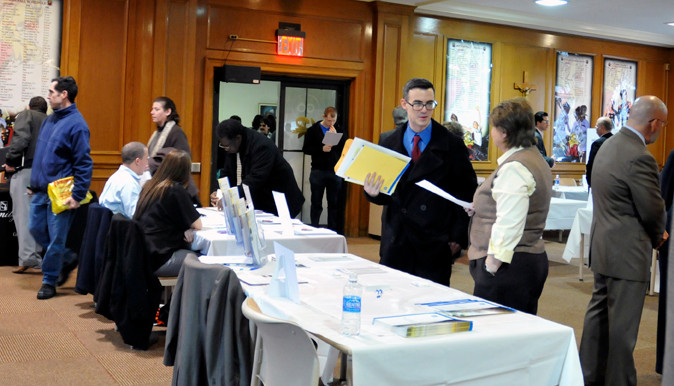 Employers met potential employees at the job fair held in Molloy College.
