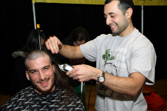 Local resident Joseph Mione traded in his long locks for a buzz cut last Saturday at the Washington Street School’s fundraiser for children’s cancer research, held in conjunction with the St. Baldrick’s Foundation.