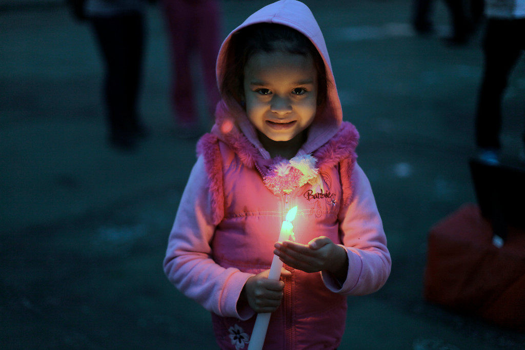 Arianna Gomez held a candle in remembrance of Trayvon Martin.