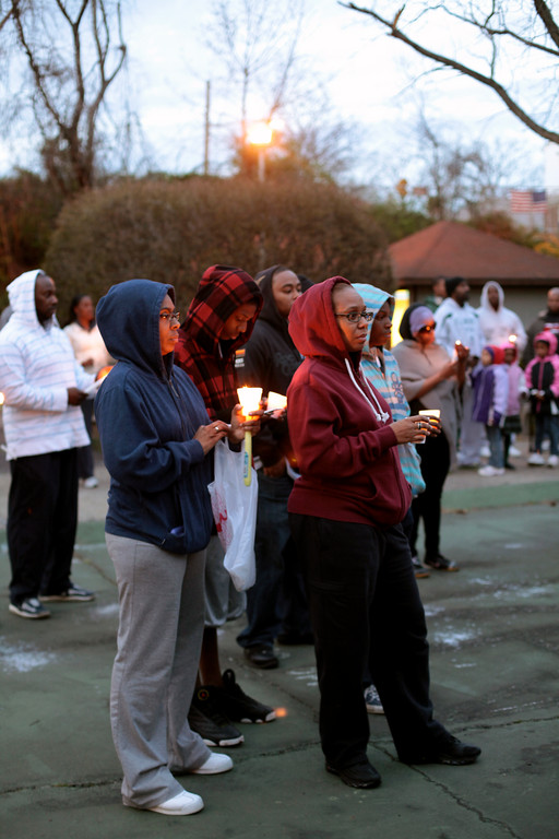Dozens of residents remembered Trayvon Martin last week, during the Elmont Cardinals’ candelight vigil.