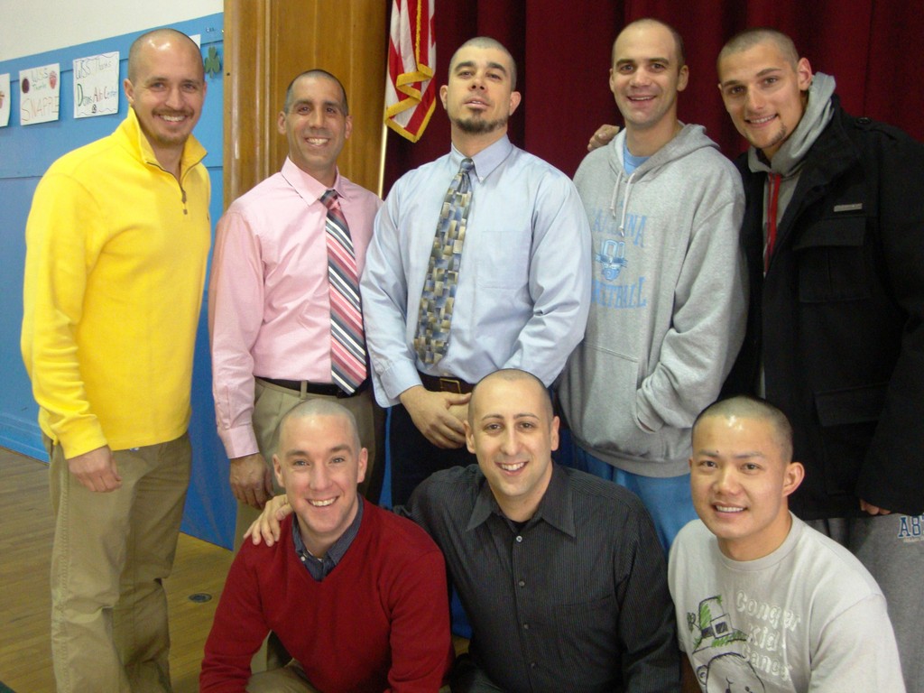 Gregg Aho, from left, top row, John Stella, Alex Soupios, Sean Boyle, Mario Piscitelli
Kneeling, Kevin Wagner, from left, kneeling, Jason Tomack and Po Chan were among the dozens of local residents who shaved their heads at the Washington Street School on March 31.