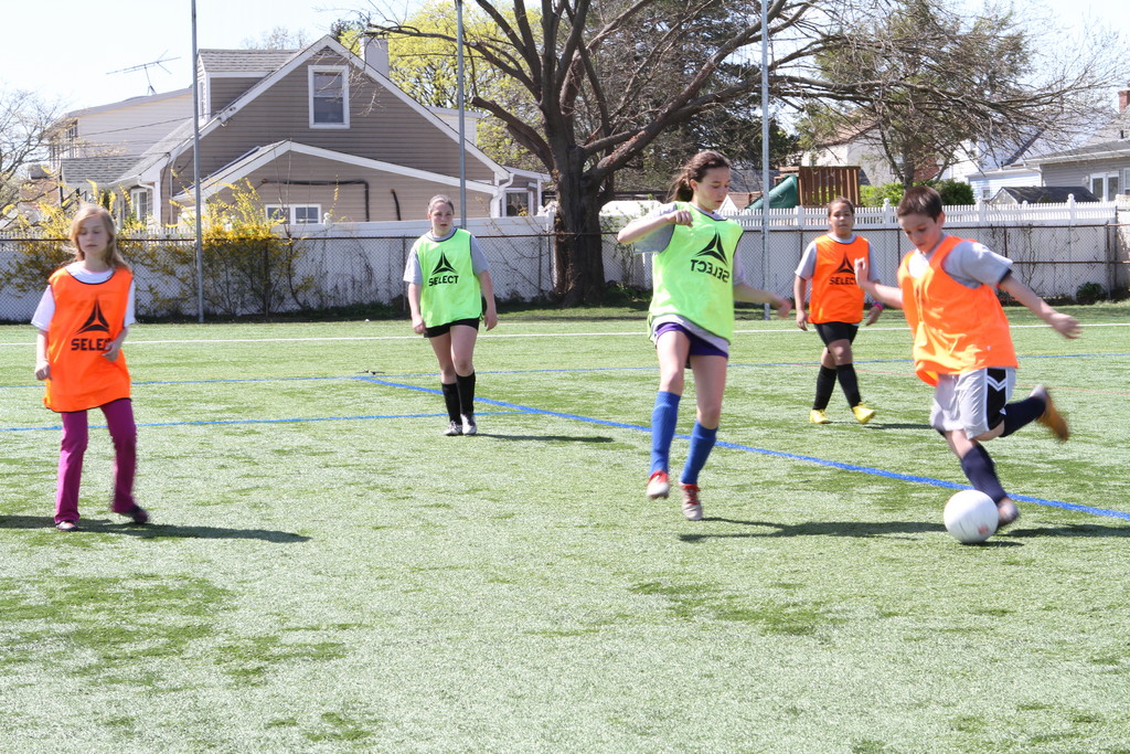 A mixed group scrimmaged last week, during a five-day soccer camp that was held by Atlantic Sports and Performance, a local sports organization.