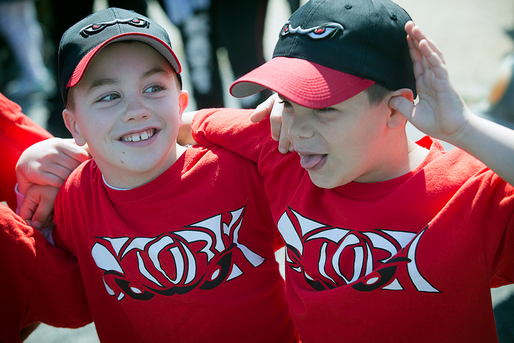 Members of the Franlkin Square Storm, Antonio Guliano, left, and Brian Morreale, were all smiles during the F.S. Little League parade, held on April 21.