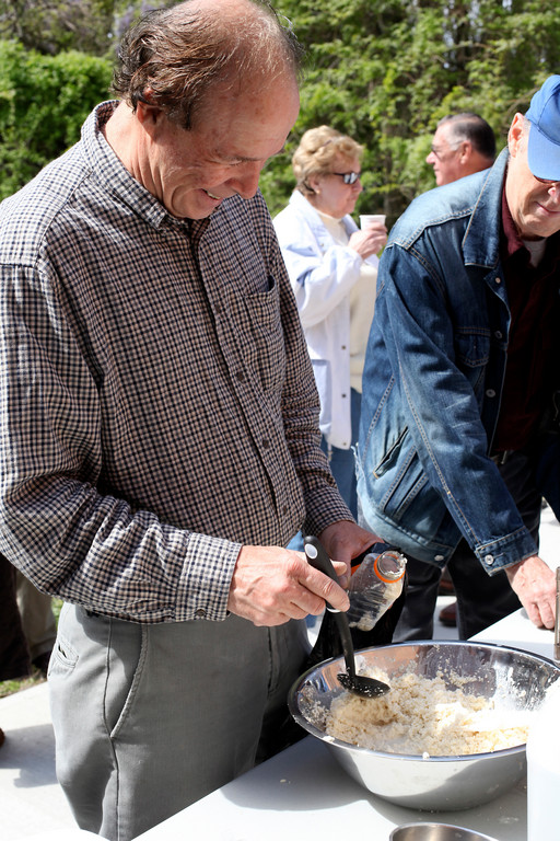 Donald Meyer of Franklin Square said he was happy to bring some finished horseradish sauce home, following the Historical Society's horseradish event.