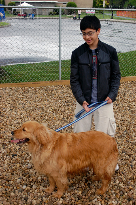 Pablo Andres Pachucho, 12, brought his dog, Golden, to the new facility.