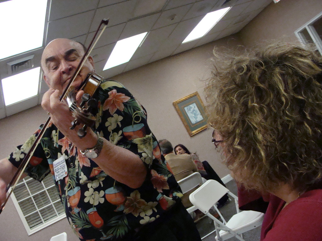 Atria resident and violinist Orion Mehus serenaded the crowd. Mehus has been playing the violin since he was nine years old.