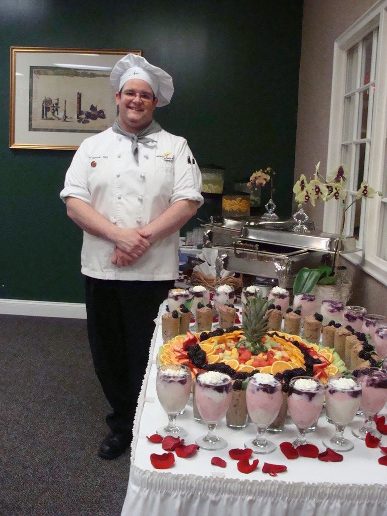 Atria Chef Brian Glennon, left,  prepared a spread of wraps, salads and decadent desserts.