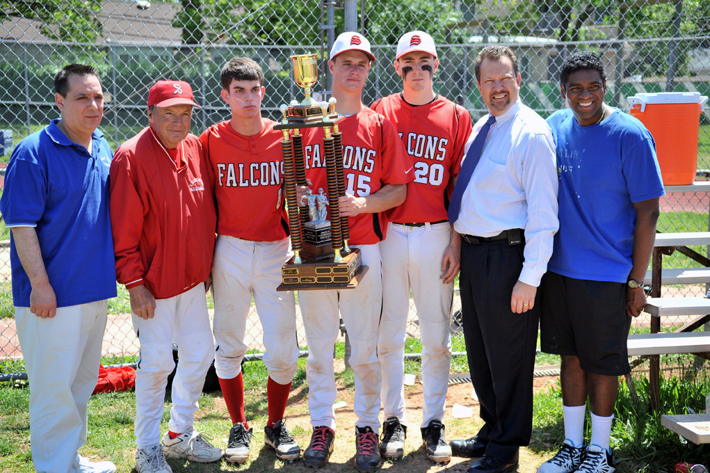 South’s Players and coaches accepted the Mayor’s Cup trophy following its 10-7 victory over Central’s baseball team last Saturday. From left are Deputy Mayor John Tufarelli, Coach Ken Ward, players Danny Goldman, Thomas Meaney and Jack Palleschi, Mayor Ed Fare and village Prosecutor Sean Wright.