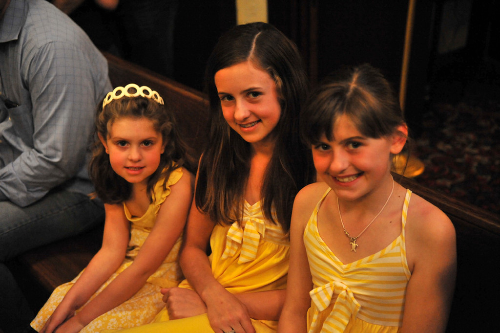 Sisters Alena, 5, left, Tara, 11, and Kayla Schwizer, 9, enjoyed the music.