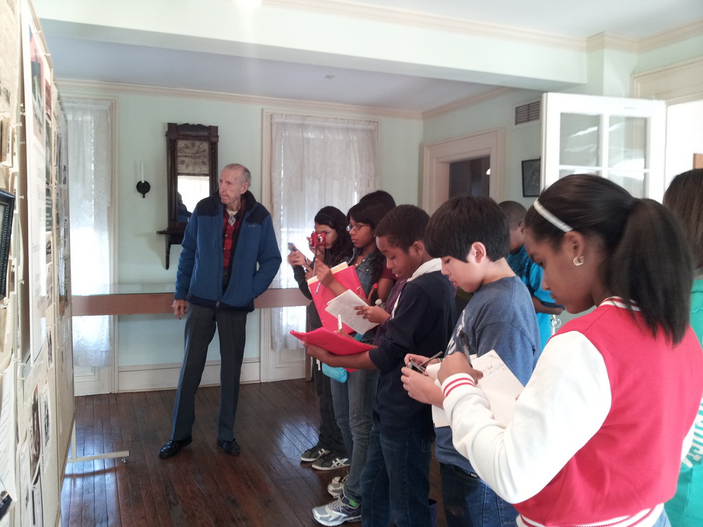 Students got a tour of the Pagan-Fletcher House led by Gabe Parish, left, while making their documentary.