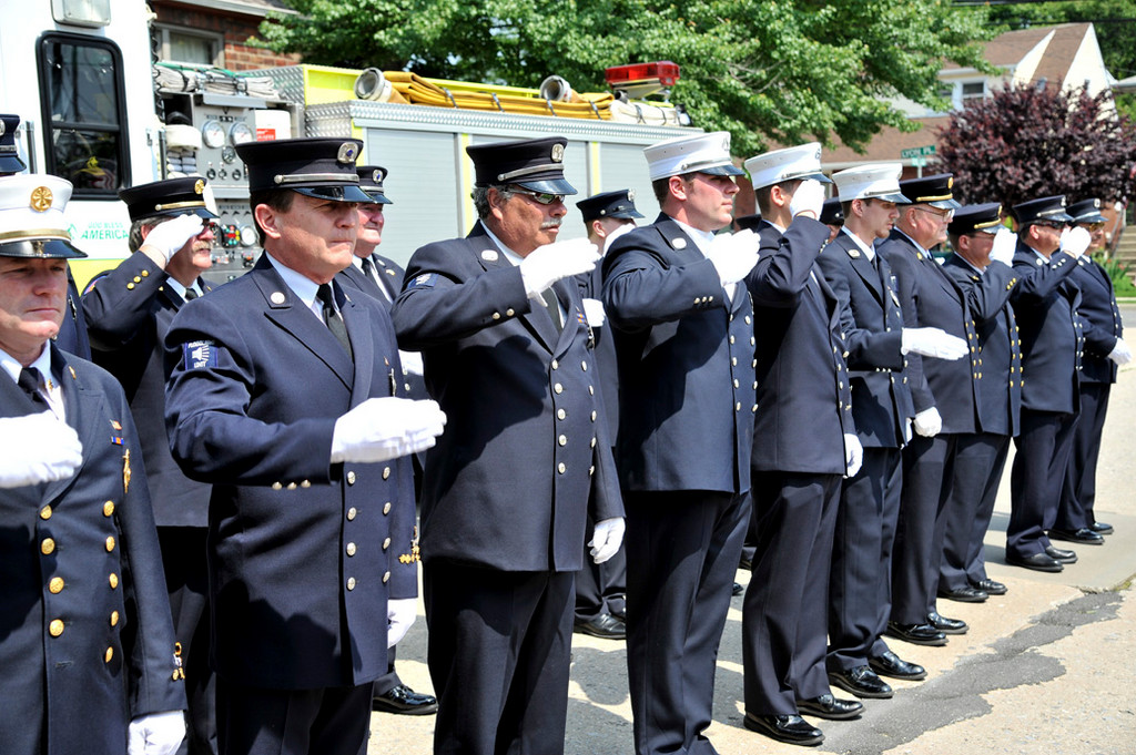 members of the Lynbrook fire department saluted the veterans at the village’s Memorial Day parade.