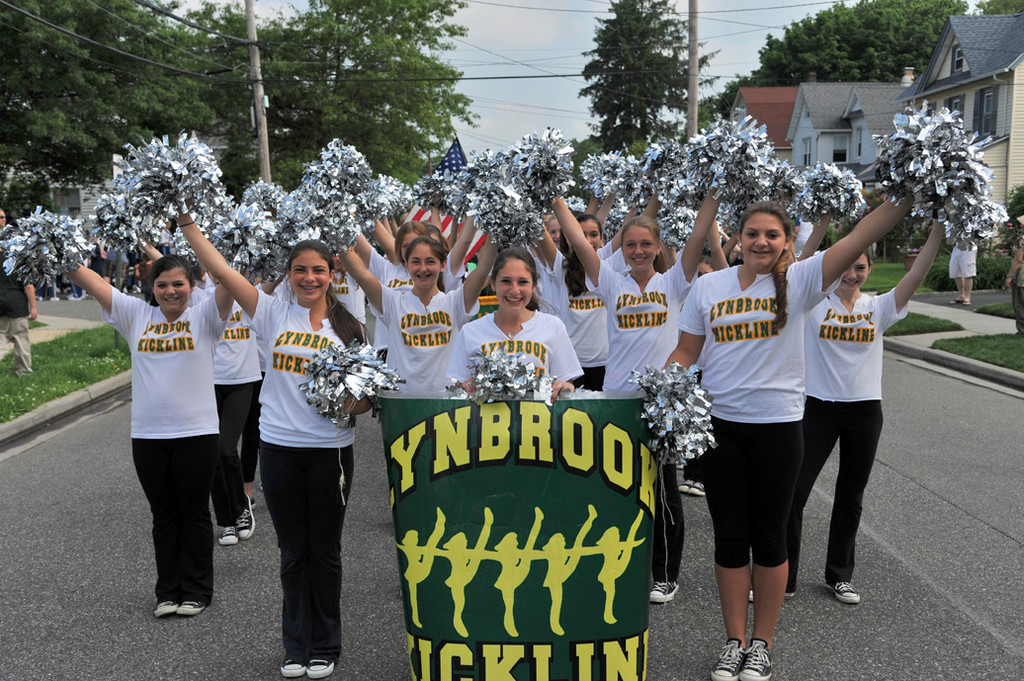 The Lynbrook Kickline waved to the crowd as they performed in the parade.