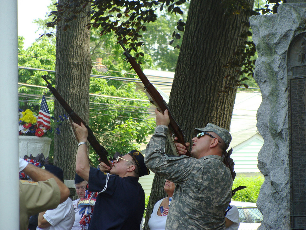 A two-gun salute was part of the concluding ceremonies in the Memorial Park rotunda.