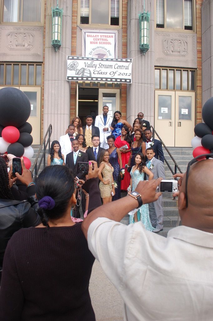 Seniors posed for pictures on the front steps of Central High School before their prom last Friday night.