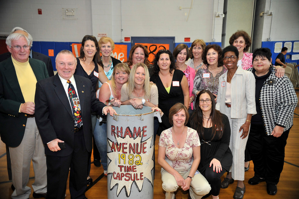 Former Rhame Avenue Elementary School students, and staff were on hand to open the 1982 capsule.