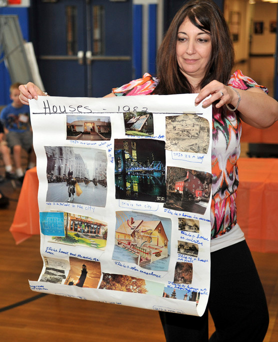 Principal Laura Guggino displayed a photo essay of houses and architecture