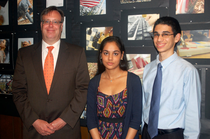 North High School valedictorian Silvia Arora, center, and salutatorian Charles Sanky, right, each took more than a dozen Advanced Placement courses, leading them to the top of the class of 2012. They are joined by Superintendent Dr. Bill Heidenreich.