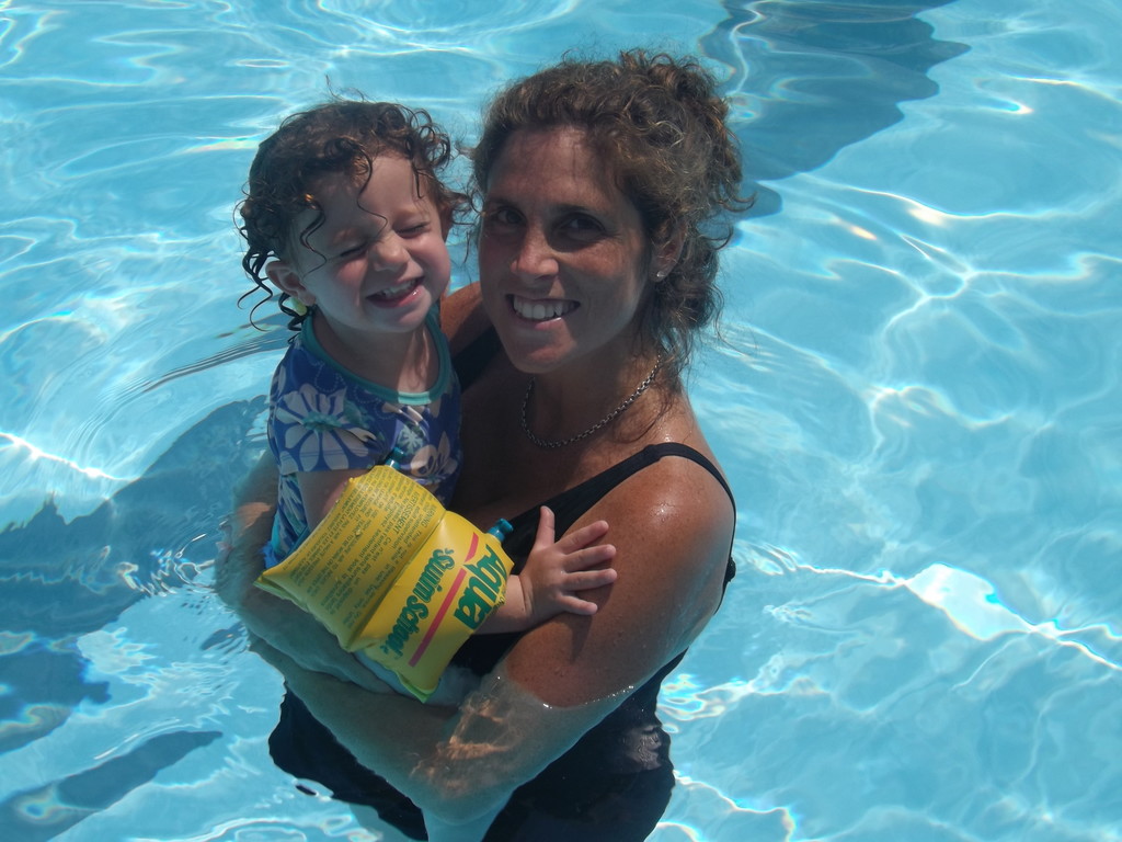 Michelle Yamen and her daughter  beat the heat at the pool.