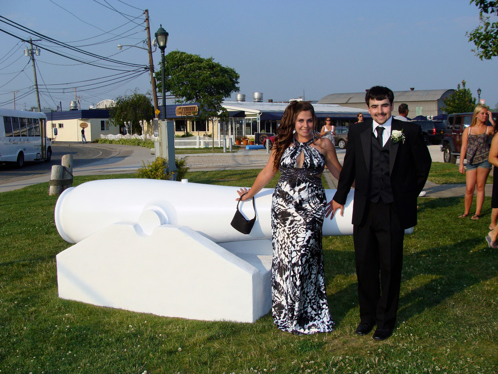Morgan Richter and Dan Boll posed by the historical White Cannon.