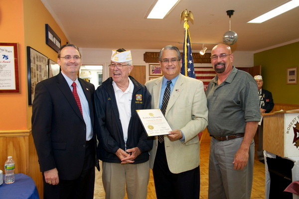 Commander Joe McCarthy with, from left, Judge Bill Gaylor, III, Councilman Anthony Santino and East Rockaway Mayor Fran Lenahan.