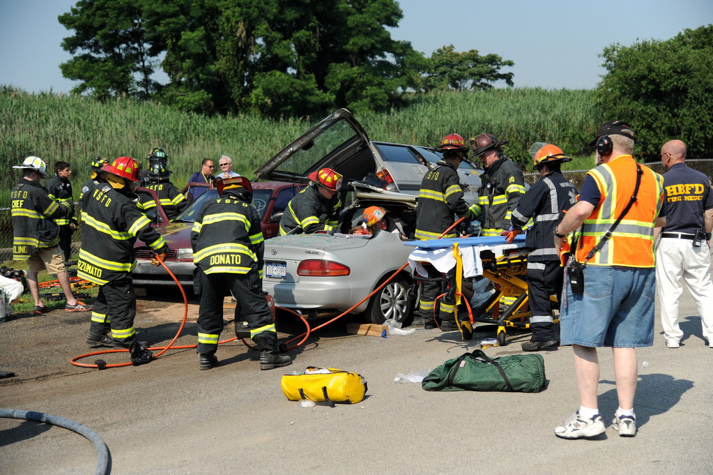 Valley Stream and other local fire departments participated in a rescue drill on July 1 at North Woodmere Park, simulating a three-car accident.