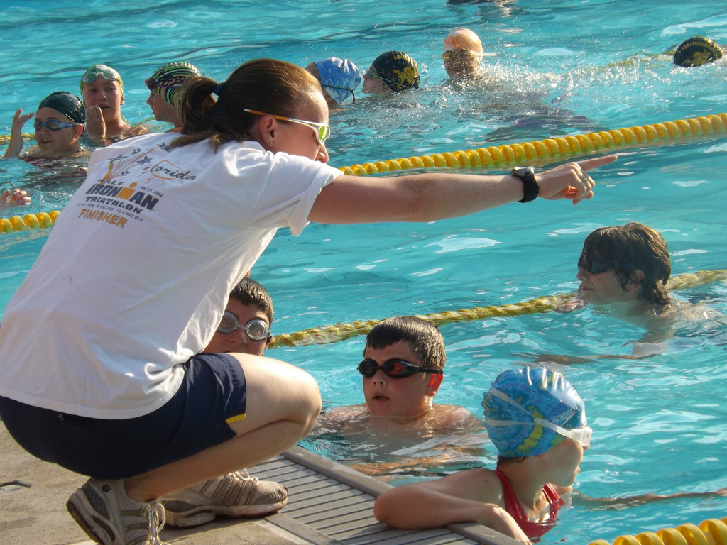 Kathleen hannan, program coordinator for the Fly with the Owls triathlon program, directed one of the middle schoolers in the Lynbrook pool.