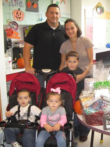 Mike and Jennifer Shanahan with their son Tyler and twins Dylan and Gabriella.