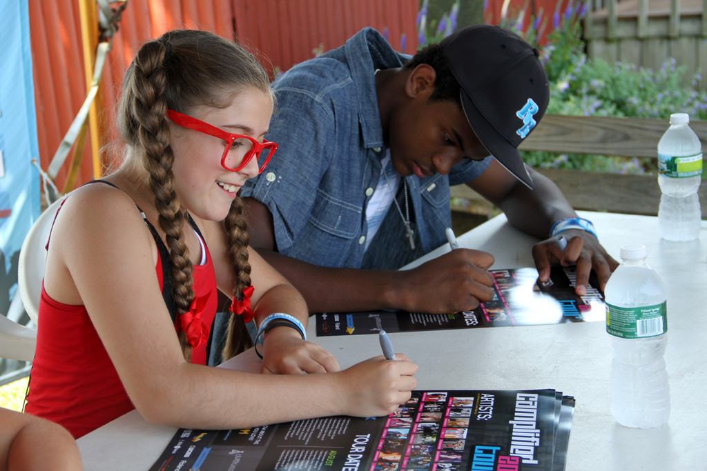 Karlee Roberts and Jackson signed Camplified posters.