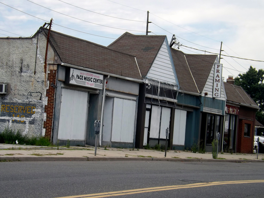 Neighbors have complained to the village on numerous occasions about the condition of vacant buildings on Gibson Boulevard, just south of the train station.