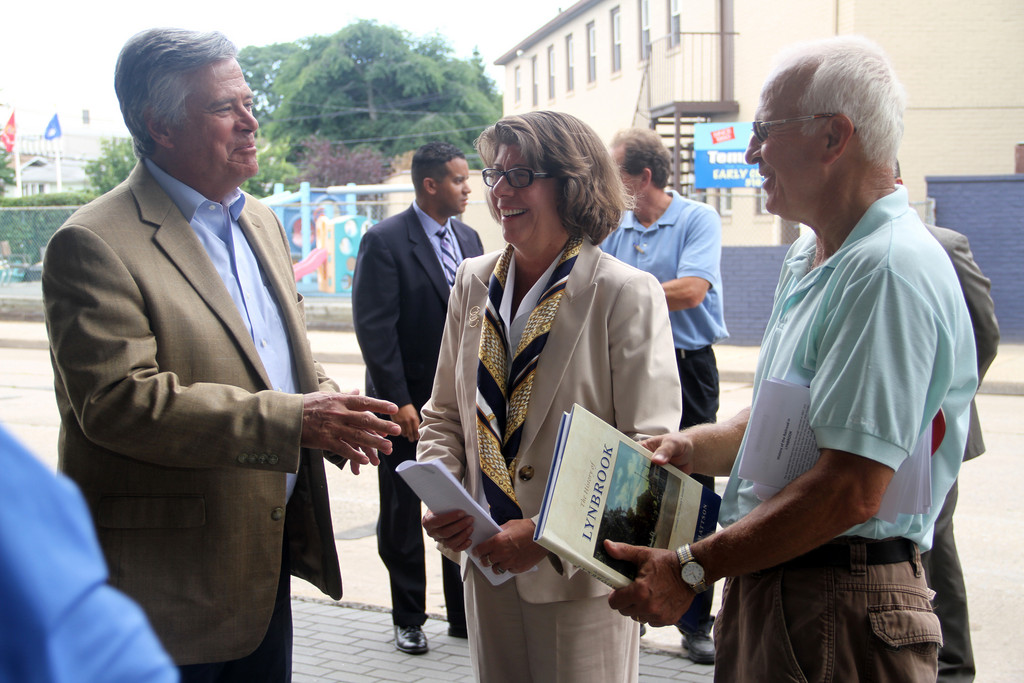 Sen. Dean Skelos, left, LIRR President Helena Williams and Lynbrook Village Historian Art Mattson chatted before the ceremony.