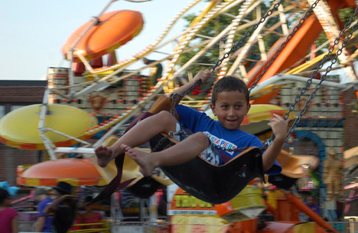 Cory Garcia, 8, of Valley Stream, enjoyed the swings at Blessed Sacrament Church’s second annual Family Festival, held on the parish grounds last weekend.