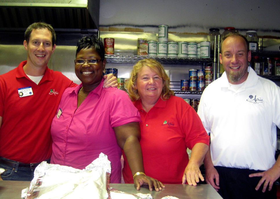 Atria staff volunteers from left: Scott Eliscu, Executive Director, Stephanie Craig: Dining Room Manager, MaryEllen Volpe: Marketing Director, and Chris Lang, Food Service Director.