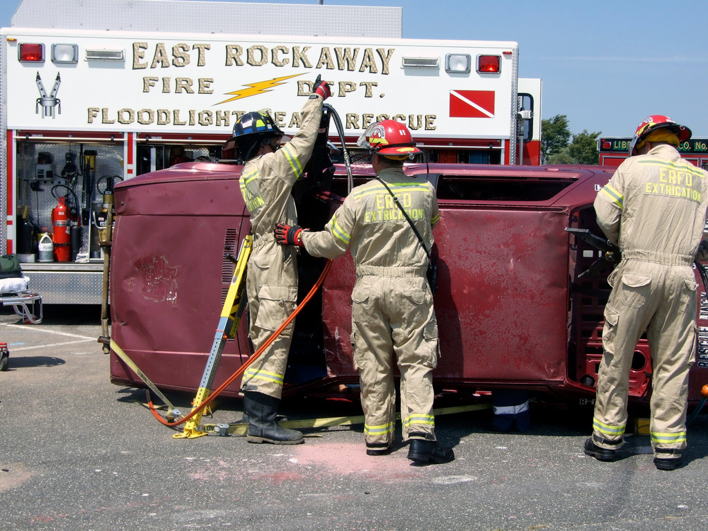 In the video, the Department’s Extrication Team worked to free a trapped civilian from an overturned vehicle.