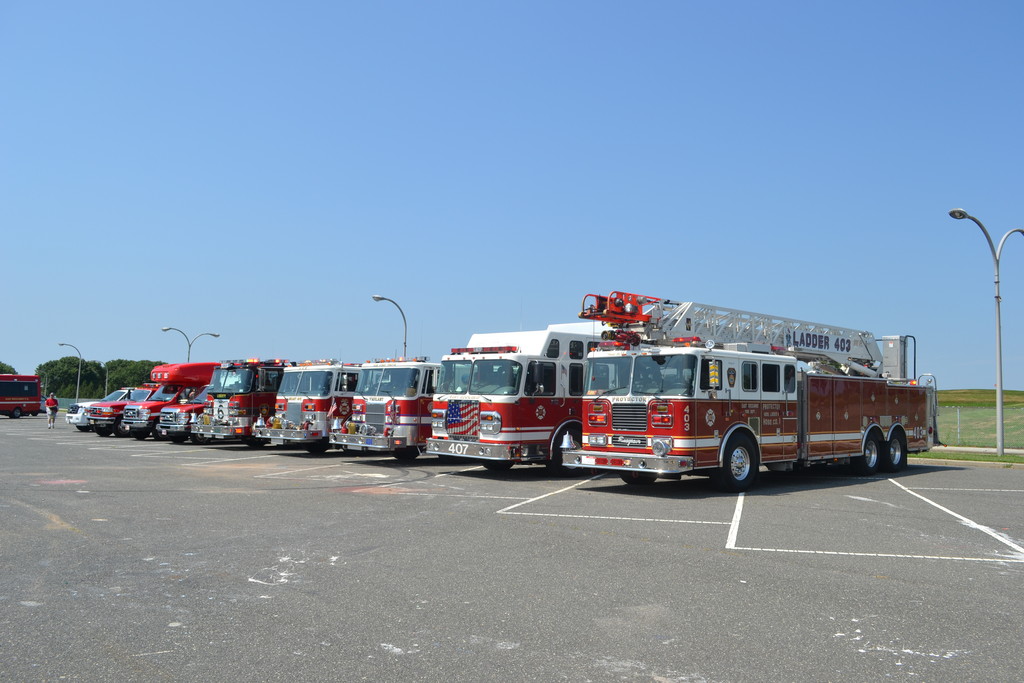 Apparatus of the ER Fire Department are lined up for a drive-by photo shoot