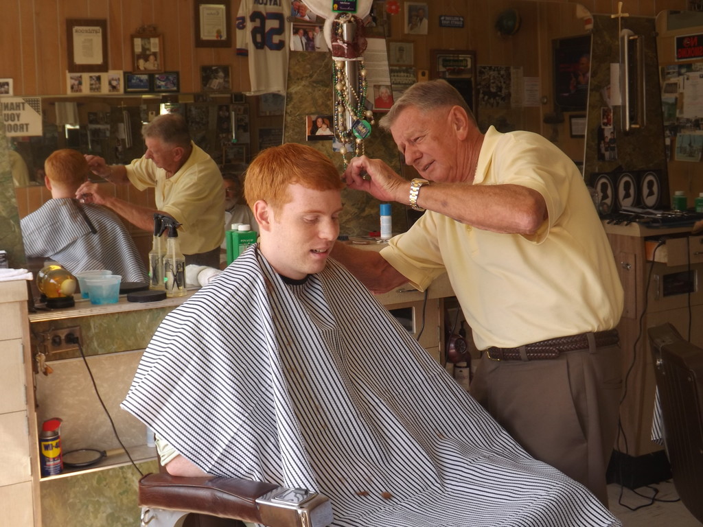 Herald reporter Brian Croce became part of his own story when Lecuit offered to give him a trim.